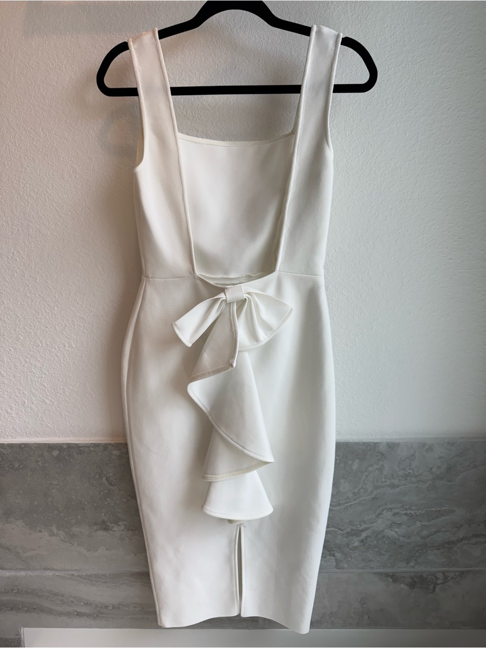 Elegant White Midi Dress with Front Ruffle Bow